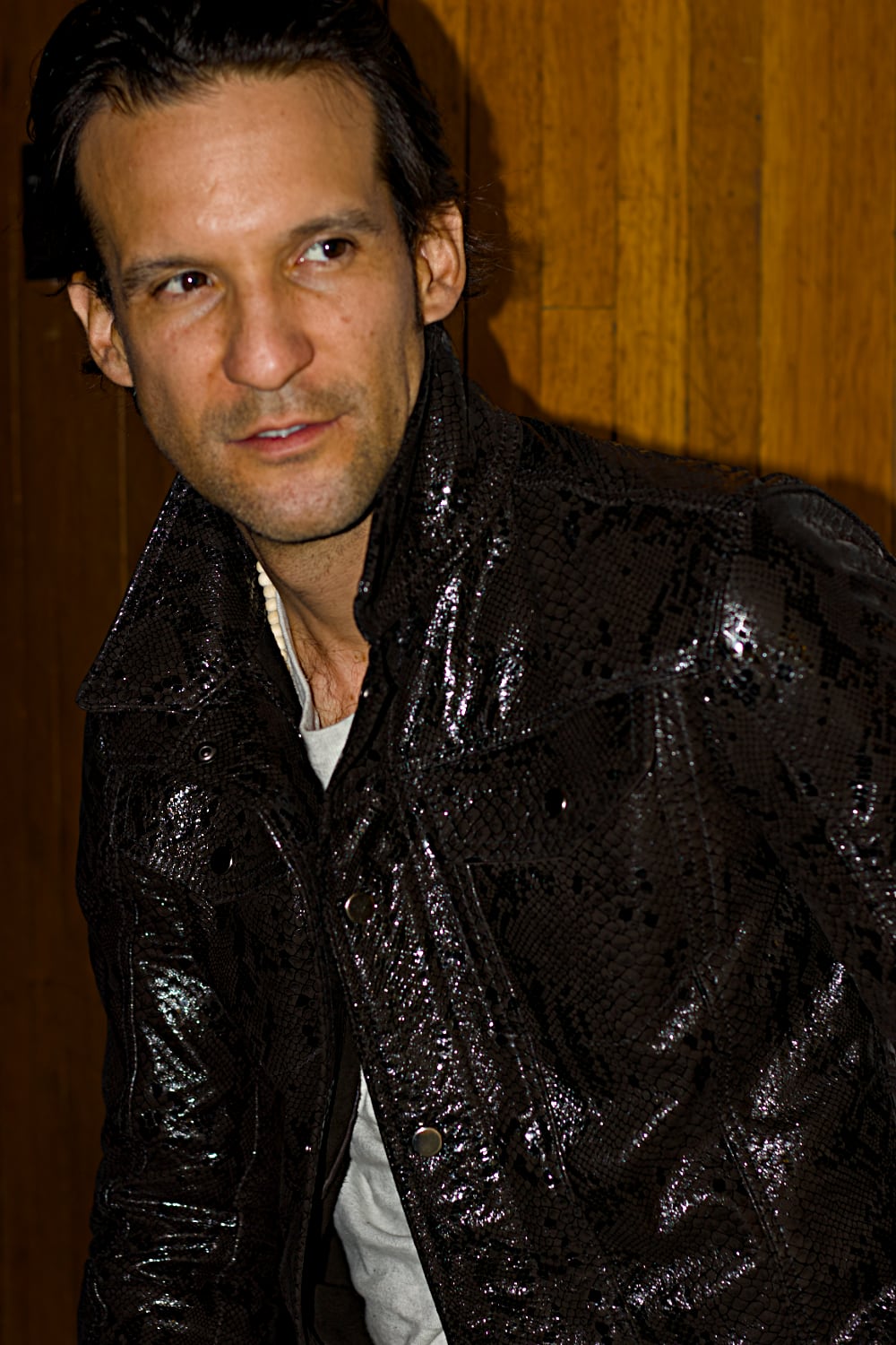SNK Shiny Snake embossed Trucker Jacket in Black Leather -