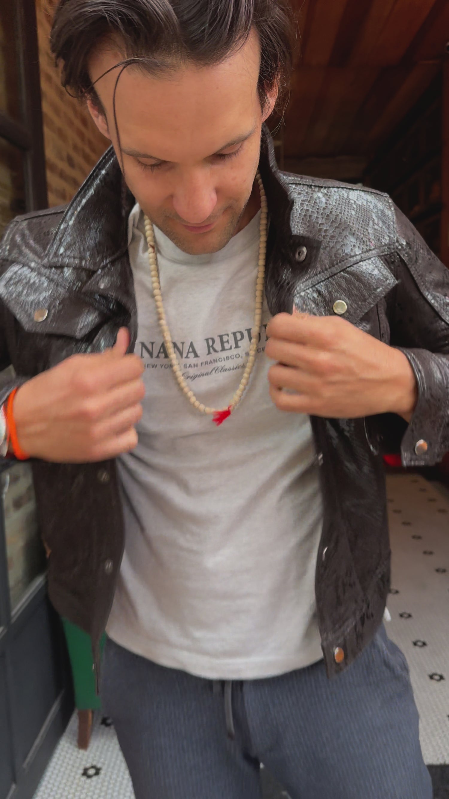 SNK Shiny Snake embossed Trucker Jacket in Black Leather -
